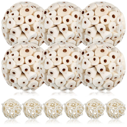 Six white woven rattan foraging balls and six smaller rattan balls arranged on white background