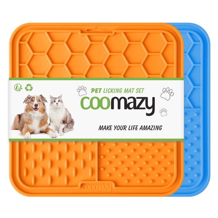 Two textured silicone dog lick mats in orange and blue with honeycomb and dotted patterns