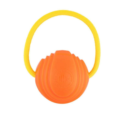 Orange ribbed rubber dog ball with yellow rope loop handle on white background