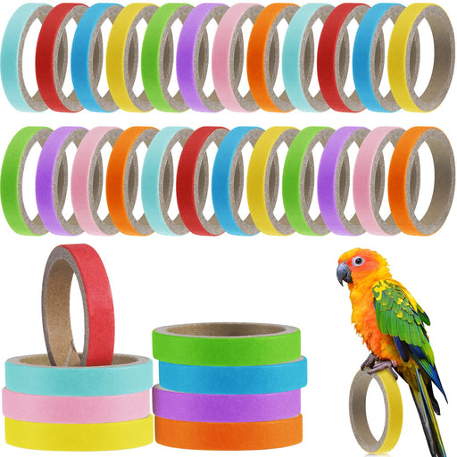 Colorful parrot bird toy rings in multiple bright colors with orange and green parrot perched on