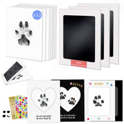 Paw print kit showing 12 cards, ink pads, heart frame cards, stickers and sample prints