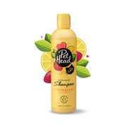 Yellow Pet Head lemonberry cat shampoo bottle with decorative fruit graphics and green leaves