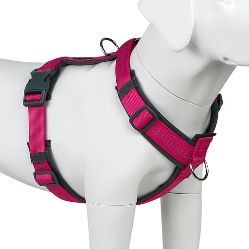 Pink reflective no-pull dog harness with black padding shown on white mannequin side angle