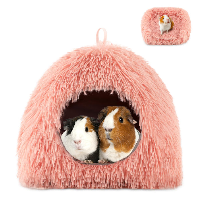 Two guinea pigs inside a pink fluffy cave bed with a small inset showing the bed's exterior