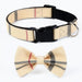 Cream colored plaid dog collar with black buckle and matching bow tie accessory