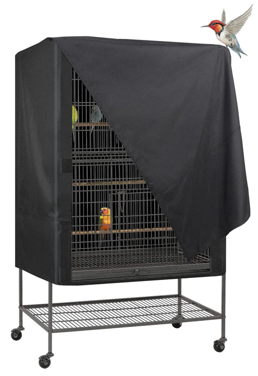 Black bird cage cover partially draped over large flight cage with colorful birds inside