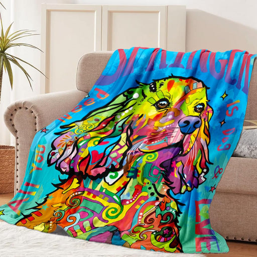Vibrant psychedelic dog art blanket draped over beige armchair in modern living room setting