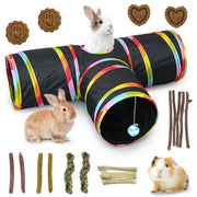 Colorful black rabbit tunnel with rainbow stripes, two rabbits, guinea pig, and various chew toys