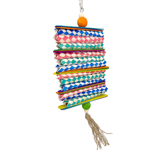Colorful woven bamboo finger trap bird toy with checkered pattern in blue, pink, and teal colors