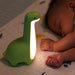 Rechargeable dinosaur night light with USB charging cable included
