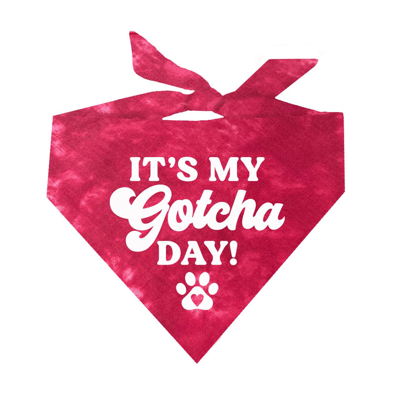 Red tie-dye dog bandana with white text reading It's My Gotcha Day and a paw print