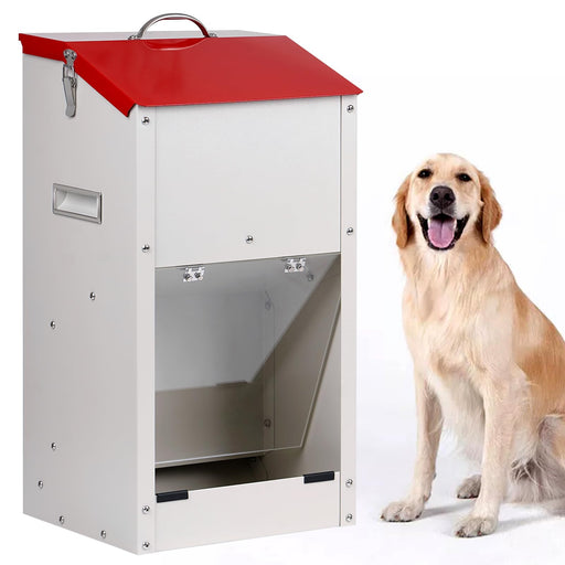 White and red metal gravity dog feeder with open tray beside a golden retriever