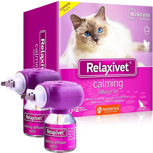 RelaxIvet calming diffuser kit with purple diffusers, refills and box featuring blue-eyed cat