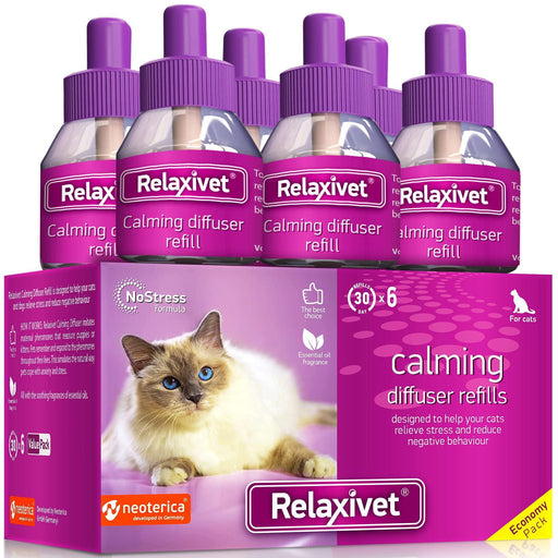 Relaxivet calming diffuser refill 6-pack box with purple bottles and Siamese cat photo