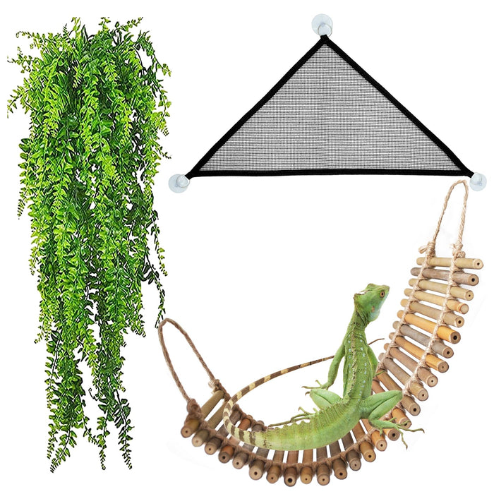Green iguana on wooden rope bridge with artificial vine plant and triangular hammock above