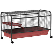 Red and black wire small animal cage with wheels, water bottle, and upper platform visible