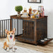 Rustic wooden dog crate with black metal bars, corgi sitting outside, food bowls and decor on top