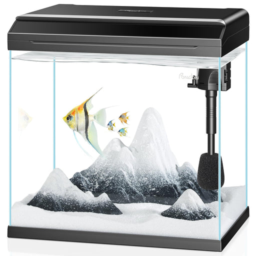 Clear 7-gallon fish tank with black hood, filter, heater, white sand and decorative rocks setup