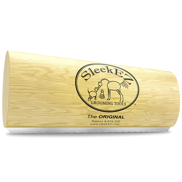 SleekEZ wooden grooming tool with oval logo showing horse and dog silhouettes on light wood surface