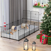 Large black wire guinea pig cage with wooden hideout and accessories in festive living room