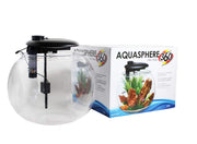 Clear spherical fish tank with black filtration system next to colorful product packaging box