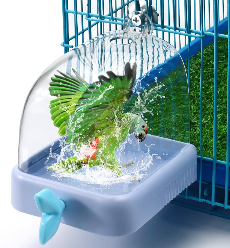Green parrot splashing water in blue square bird bath attached to cage with shower feature