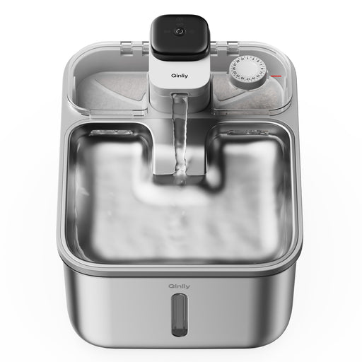 Stainless steel wireless cat water fountain with timer dial and transparent lid showing internal