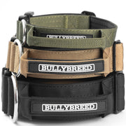 Three tactical dog collars in olive green, tan, and black with BULLYBREED labels and D-rings