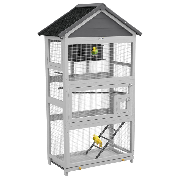 Large gray wooden bird aviary with three levels, wire mesh panels, and two yellow birds inside