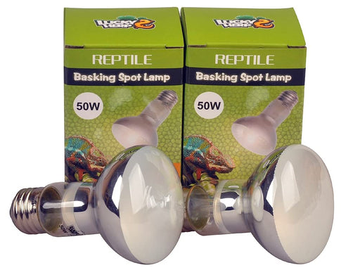 Two 50W reptile basking spot lamps displayed in front of green product boxes with chameleon graphics