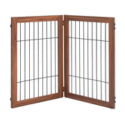 Two-panel walnut wood and black wire pet gate folded in V-shape on white background