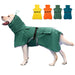 White dog wearing green hooded raincoat with straps, showing four color options above