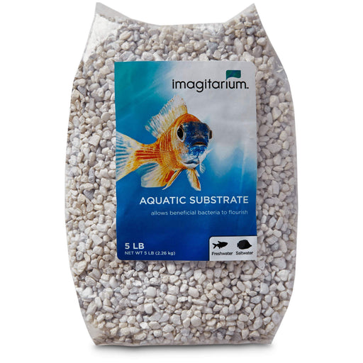 Bag of white aquarium gravel substrate with Imagitarium brand label featuring colorful fish