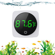 White square aquarium thermometer displaying 81.6°F in green LED with underwater fish scene