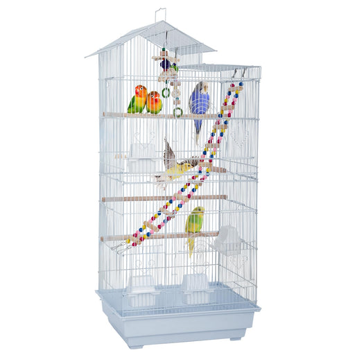 White tall bird cage with colorful parrots, perches, toys and ladder on white background