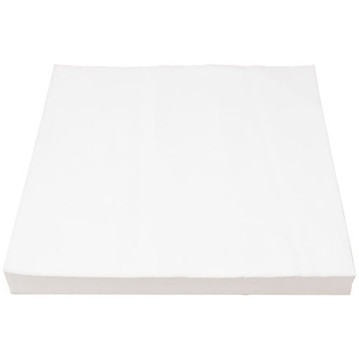 Stack of white disposable bird cage liner papers shown at an angle on white background