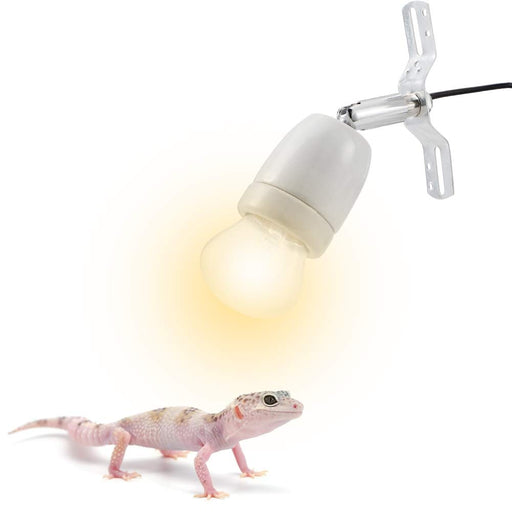 White ceramic heat lamp with metal clamp illuminating a pink leopard gecko on white background