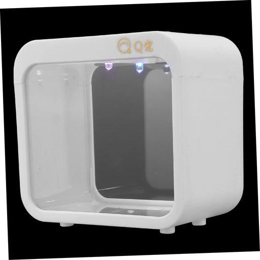 White desktop mini aquarium with LED lights and transparent viewing window on black background