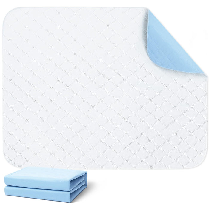 White quilted dog training pad with blue backing corner folded up, stack of blue pads below
