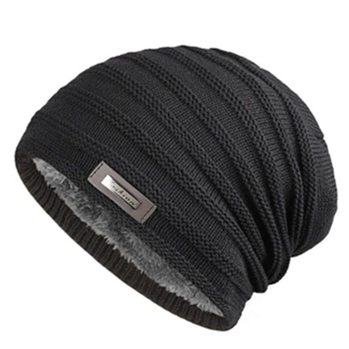 Winter cap with classic chunky knit pattern available in multiple fashionable colors
