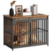 Wooden dog crate end table with black metal bars containing golden retriever, styled with books