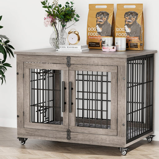 Gray wooden dog crate end table with black metal bars and dog food bags on top