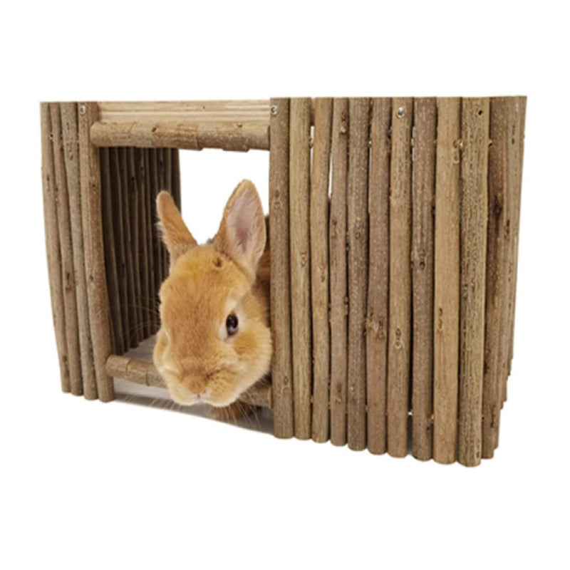 Orange rabbit peeking out from natural wood slat hideaway tunnel with vertical wooden bars