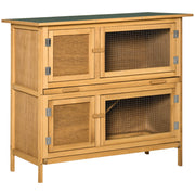 Two-tier wooden rabbit hutch with natural wood finish, wire mesh doors, and green roof