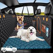 XL black quilted truck dog seat hammock with two dogs inside a car interior