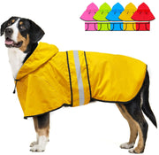 Black and tan dog wearing yellow waterproof raincoat with reflective stripes and hood